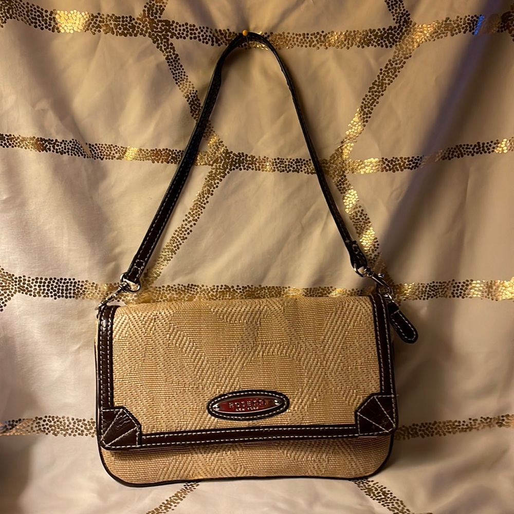 Rossetti clutch/wristlet canvas with vinyl trim.